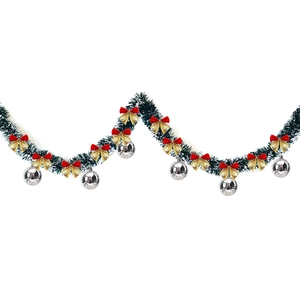 Detail of 2m green Christmas garland with white tips, red-gold bows, and silver ornaments