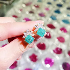 Luxe gold studs with mint green square AAA zircon flower for a sophisticated look