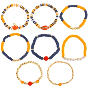 Close-up of Game Day bead bracelets with football charms and orange heishi clay discs