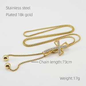 Detail of 18k gold plated stainless steel cross necklace with adjustable slide clasp