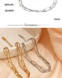 Detailed view of gold and silver double-layer stainless steel bracelets on elegant ceramic
