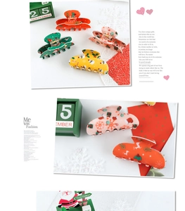 Detail of Christmas claw clips with patterns of Santa Claus, snowmen and reindeer