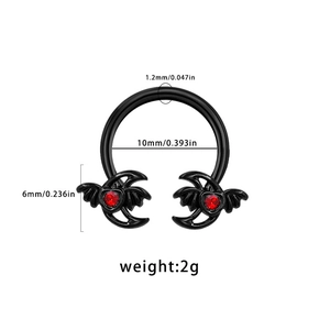 Detail showing 1.2mm black horseshoe nose ring with red gem bats and size measurements
