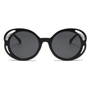 Chic oval hollow-out sunglasses in black frame with gray lenses for 2024 street style