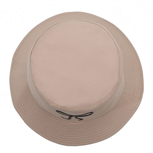 Minimalist beige sun hat with bow embroidery and reinforced brim for women outdoor wear