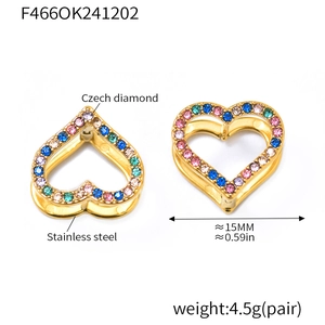 Macro shot of stainless steel heart earrings with colorful inlaid Czech diamonds
