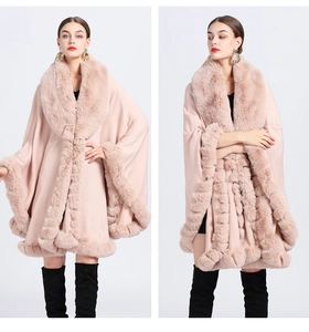 Pink knit shawl cape with faux rabbit fur trim shown in multiple model poses