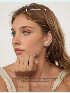 Close-up of S925 sterling silver lilac flower stud earring with pink stone on model