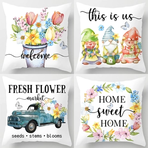 Set of four floral peach skin pillow covers with spring garden patterns and welcome text