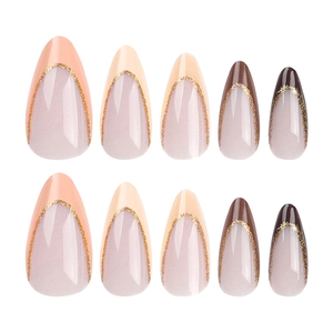 French ombre almond press-on nails in warm earth tones with gold glitter edge