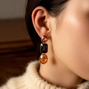 Vintage gold crystal drop earrings with round, square, and oval amber stones