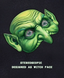 Detail of green stereoscopic witch face mask with realistic skin texture for Halloween