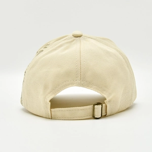 Detail view of cotton baseball cap back with bronze adjustable metal buckle and strap