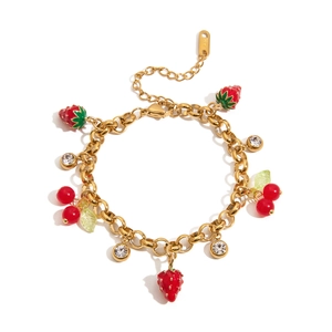 Gold-tone stainless steel bracelet with red strawberry, cherry and crystal charms