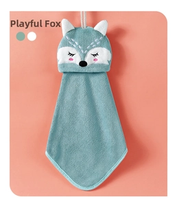 Close-up of cute blue fox hand towel with detailed embroidery and microfiber texture