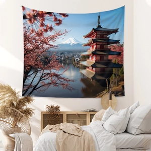 Detail of Mount Fuji tapestry featuring cherry blossoms and pagoda in a bedroom setting