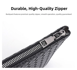 Macro shot of silver metal zipper and black woven leather texture on a men's clutch bag