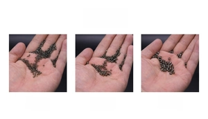 Macro view of 2mm, 3mm, and 4mm gunmetal silver-lined glass beads for jewelry DIY