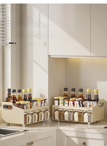 Close-up of double-tier cream storage rack with spice jars and metal support legs
