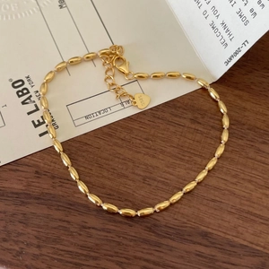 Minimalist S925 sterling silver gold-plated olive bead bracelet with heart charm