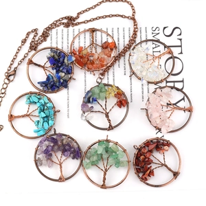 Handmade copper Tree of Life necklace featuring diverse natural amethyst and crystal stones