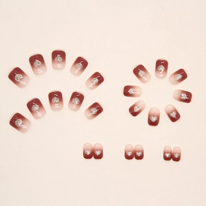 Gradient wine red press-on nails with silver glitter hearts in 24-piece full set
