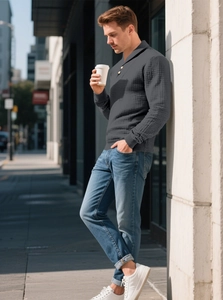 Detailed waffle knit texture and buttoned polo collar on a slim-fit dark grey sweater