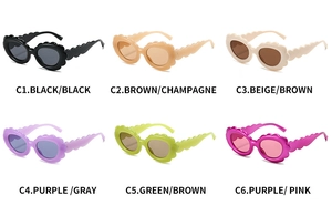 Detailed view of oval sunflower sunglasses in six assorted colors with scalloped frames