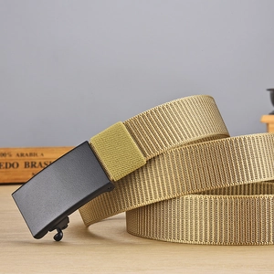 Detailed macro view showing the sand-colored woven nylon texture and matte black buckle