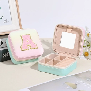 Portable gradient jewelry box with chenille letter A and internal mirror organizer