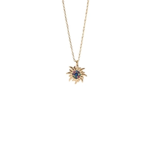 Golden sunburst necklace featuring a blue center stone and multicolor zircon pavé crystals