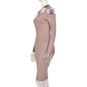 Detail of mauve halter neck long sleeve knit dress showing the slim fit silhouette