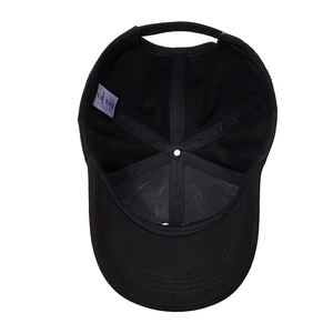 Interior view of black baseball cap showing six-panel cotton structure and sweatband