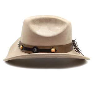 Detail of beige suede cowboy hat with star studs and orange beads on leather band