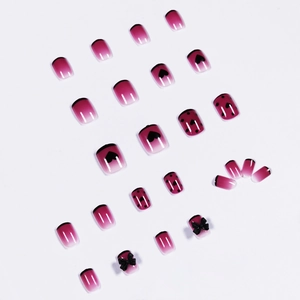 Faux ongles courts carrés dégradé violet avec cœurs noirs, pois et nœuds 3D décoratifs