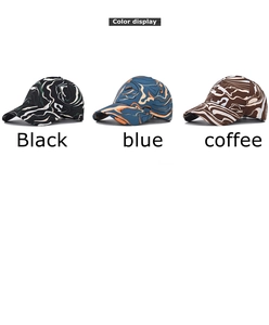 Detailed color display of tie-dye marble print baseball caps in black, blue and coffee