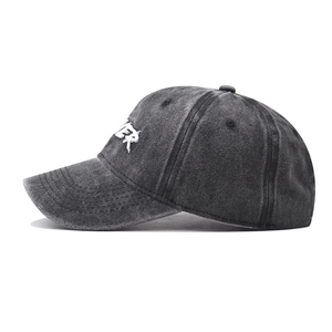 Close-up of Forever 3D embroidery and washed canvas texture on a dark grey baseball cap