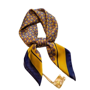 Silk-like 70cm square scarf with yellow and blue geometric patterns and golden buckle