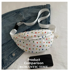 Detailed view of white floral waist bag with colorful polka dots and adjustable strap