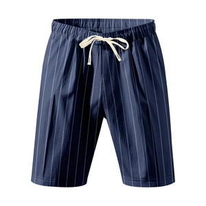 Detailed view of dark blue striped men's shorts with white drawstring and elastic waist