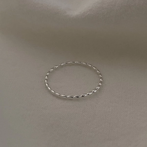 Minimalist 925 sterling silver beaded ring featuring a polished olive bead texture design