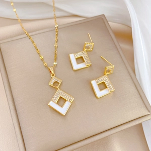 Titanium steel jewelry set with gold square necklace and earrings featuring white enamel