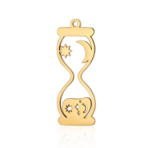 Detail of golden hourglass pendant with celestial moon and star cutouts in stainless steel