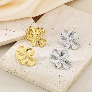 Sleek ginkgo leaf stainless steel earrings in gold and silver finish for women