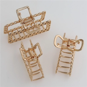 Minimalist gold alloy hair claw clips with woven texture for women in large square shape