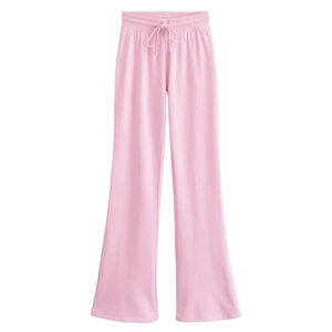 Detail of pink wide-leg trousers with drawstring elastic waistband and smooth drape texture