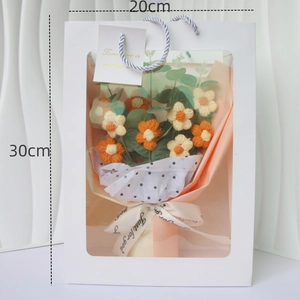 Detail of crochet flower bouquet in a 30cm white window gift bag with Just for you ribbon