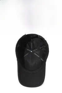 Detail of baseball cap interior showing breathable black mesh and narason branded tape