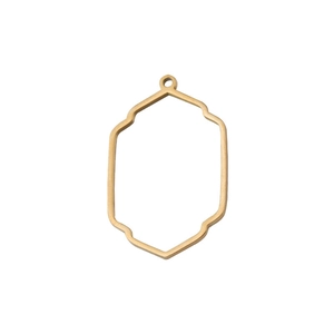 Macro shot of gold hollow octagon pendant frame with metal shine for DIY jewelry