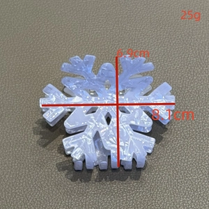 Blue snowflake hair claw clip with marble texture, measuring 8.1cm for winter hairstyles